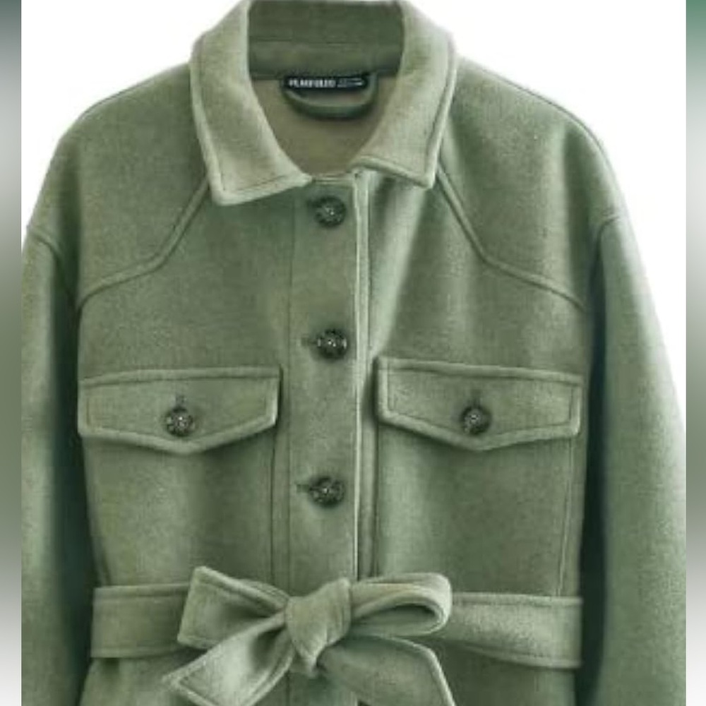 Runs size larger.  Sized Small, however Large Fit Women's Green Belted Jacket